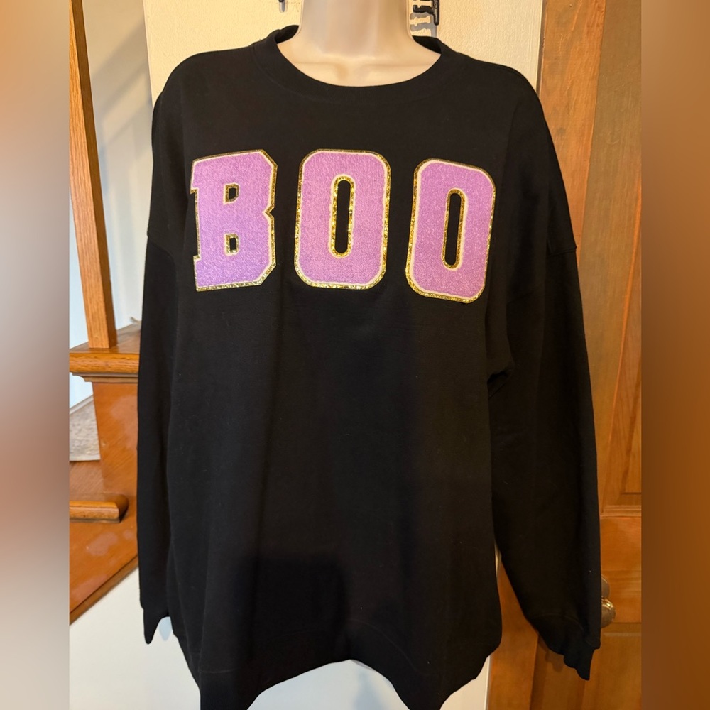 Pink Lily NWOT “ BOO “ patch graphic sweatshirt. Black w/ purple & gold size L